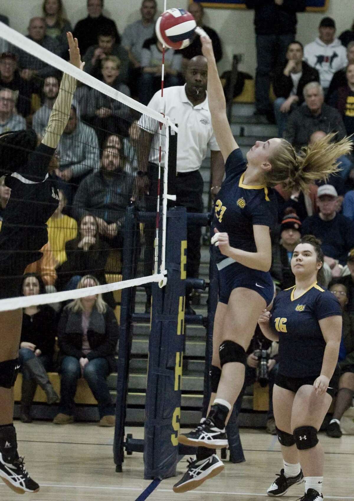 Woodstock Academy's Amelia Large fires a shot in the class L volleyball championship game against Joel Barlow High School, played at East Haven High School. Nov. 17, 2018