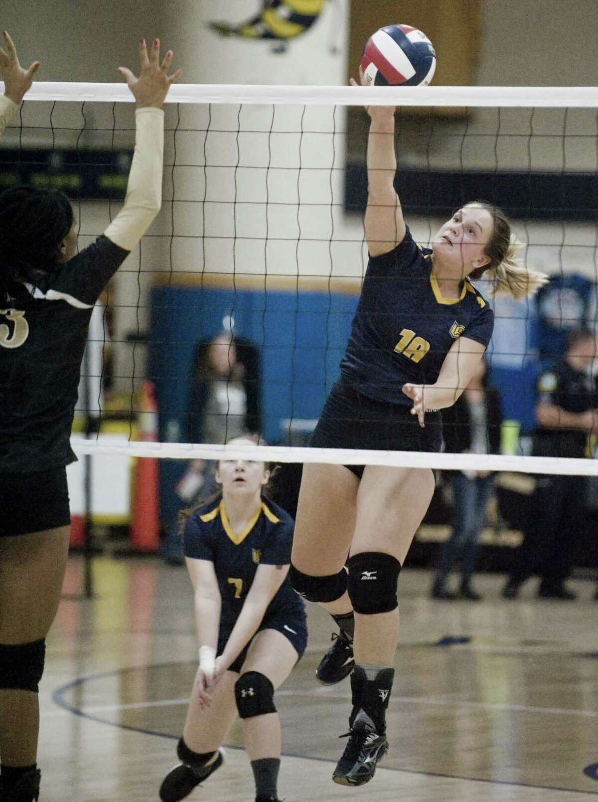 Woodstock Academy's Katherine Papp fires a shot in the class L volleyball championship game against Joel Barlow High School, played at East Haven High School. Nov. 17, 2018