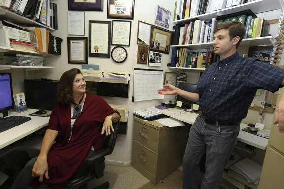 SA Gives story on Aspergers101, a San Antonio-based website resource for people with high-functioning austism and aspergers syndrome. Jennifer Allen (left) founded the site, inspired by her son Samuel (right), who has been diagnosed withs high-functioning autism. (Kin Man Hui/San Antonio Express-News)
