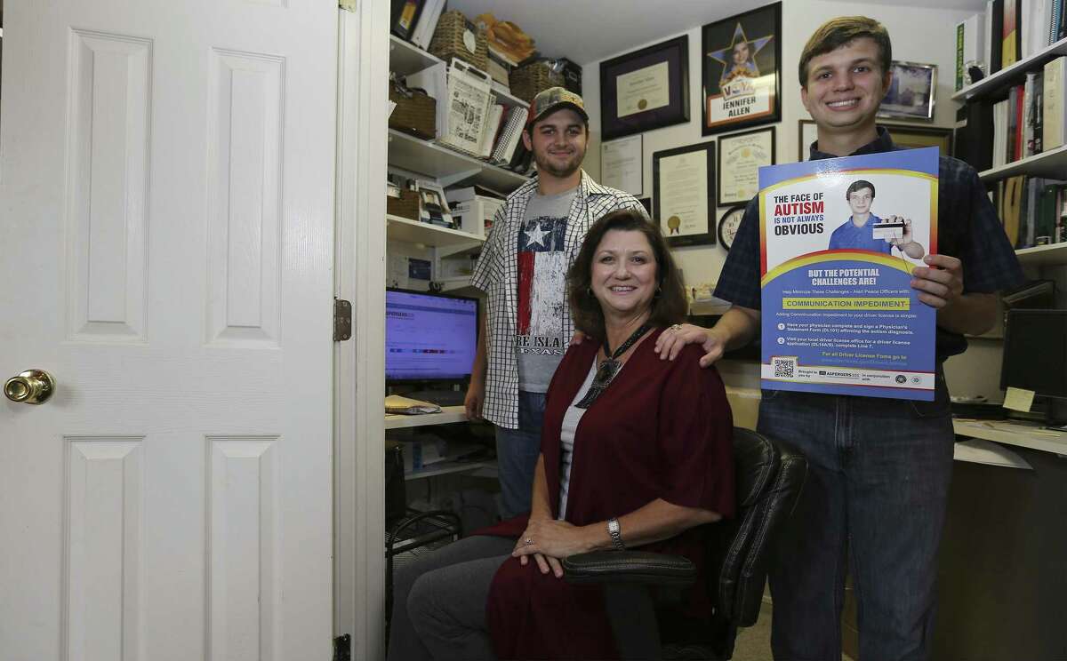 Jennifer Allen (center) and her sons Charlie (left) and Samuel (right) are seen in a renovated closet in their home where Allen started Aspergers101, a San Antonio-based website resource for people with high-functioning austism and aspergers syndrome. Jennifer Allen founded the site, inspired by her son Samuel, who is high-functioning autistic. Through Allen's efforts, people with autism and aspergers now have coding on their driver's licenses or IDs to indicate their condition so that law enforcement are aware when dealing with someone with communication impediment. Samuel shows a poster that is placed in DMV offices to inform people on how to apply for the communication impediment code on their licenses. (Kin Man Hui/San Antonio Express-News)