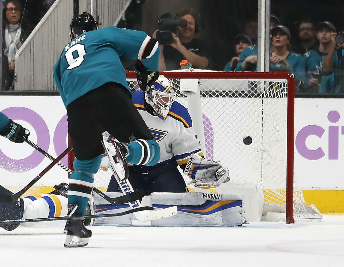San Jose Sharks left wing Evander Kane (9) scores a goal past St. Louis Blues goaltender Chad Johnson (31) during the second period of an NHL hockey game in San Jose, Calif., Saturday, Nov. 17, 2018. (AP Photo/Tony Avelar)