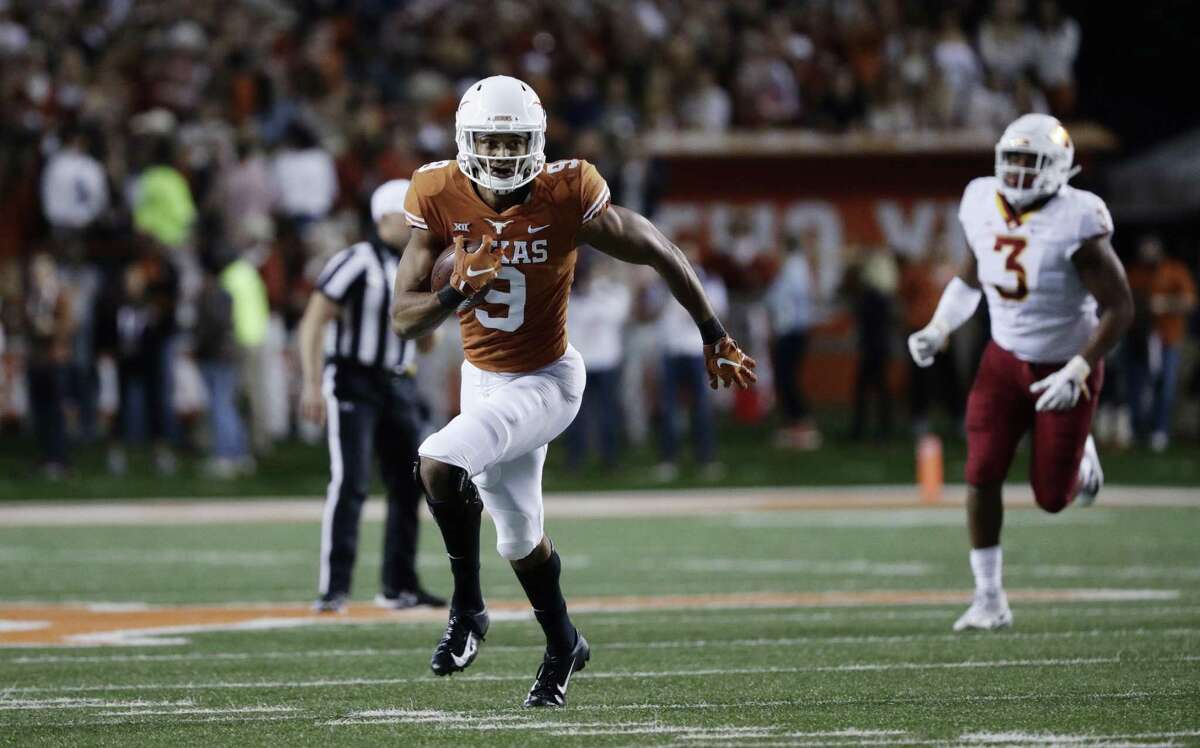 Texas wide receiver Collin Johnson (9) runs after making a catch against Iowa State during the first half of an NCAA college football game, Saturday, Nov. 17, 2018, in Austin, Texas. (AP Photo/Eric Gay)