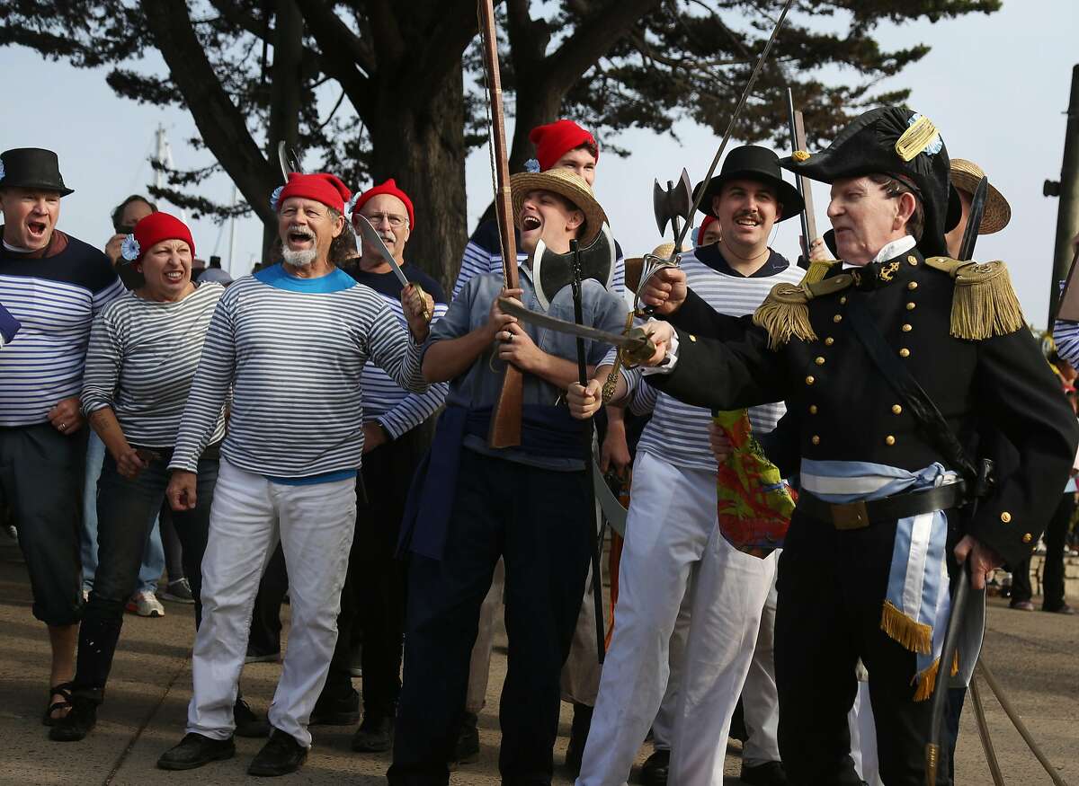 Reenactors portraying Argentine privateers/pirates prepare to pull down the Spanish flag and raise the Argentinian flag above Monterey as Spanish troops retreat during the bicentennial reenactment of the Battle of Monterey on Saturday, 11/17, 2018 in Monterey, California.