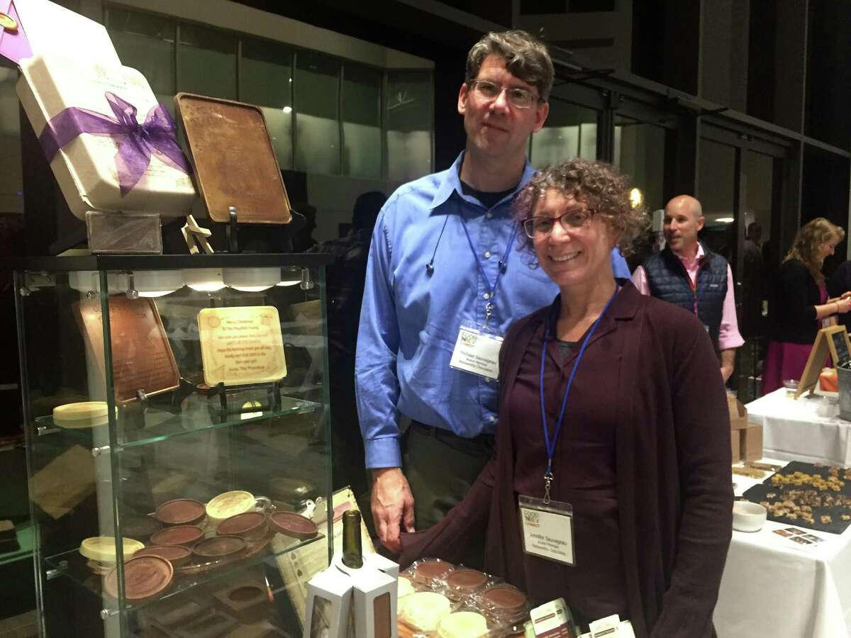 Michael and Jennifer Sauvageau, founders of Bethel-based Noteworthy Chocolates, show their products at a showcase for companies in The Business Council of Fairfield County’s Food’NBev Connect accelerator program, on Tuesday, Nov. 13, 2018, at the Shippan Landing complex in Stamford, Conn.