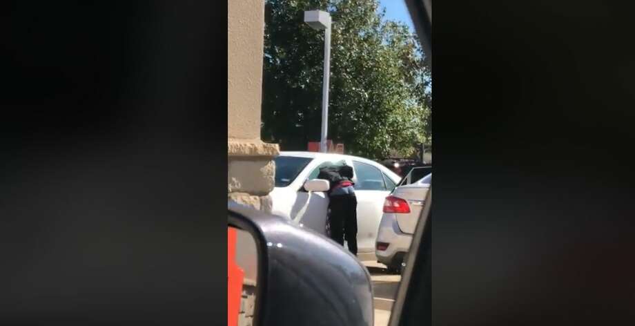 Friendswood Police are asking for the public's help in identifying a man caught on camera stealing from a car in broad daylight at a Friendswood area Whataburger. Photo: Courtesy Friendswood Police Department