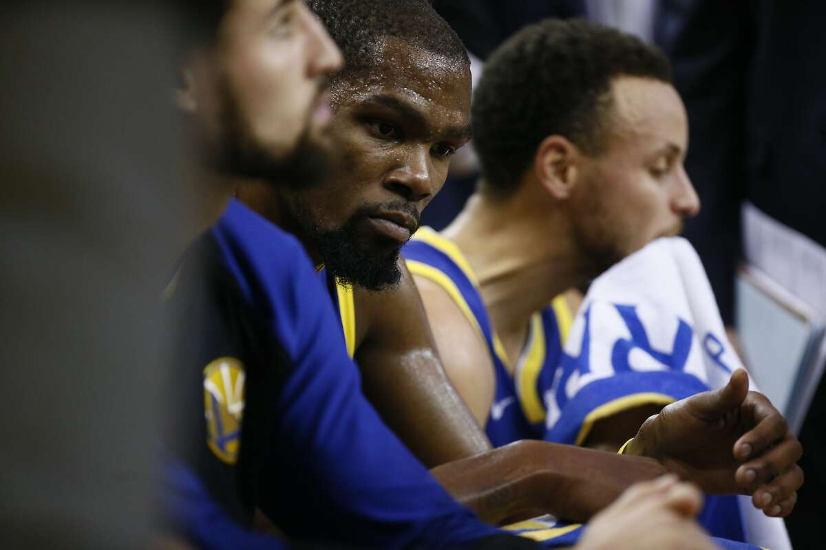 Golden State Warriors forward Kevin Durant (35) during a timeout in the first half of an NBA game between the Golden State Warriors and Minnesota Timberwolves at Oracle Arena on Friday, Nov. 2, 2018, in Oakland, Calif.