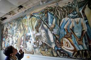 Repairs to historic John Biggers mural on hold, roof repair funds needed