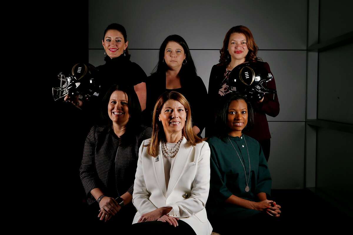 (Front row left-right) Nikki Epley, Director of Stadium and Game Operations, Patricia Ernstrom, Executive Director, Bay Area Host Committee, Laila Brock, Senior Director of Operations and Logistics, ( back row left-right) Gina Lehe, Senior Director of External Relations and Branding, Alison Doughty, Director of Events and Hospitality Services, and Andrea Williams, Chief Operating Officer, pose for a photographed at Rotary Summit Center, San Jose, Calif., on Nov. 16, 2018. The College Football Playoff Championship will be held in January. (Josie Lepe/Special to the Chronicle)