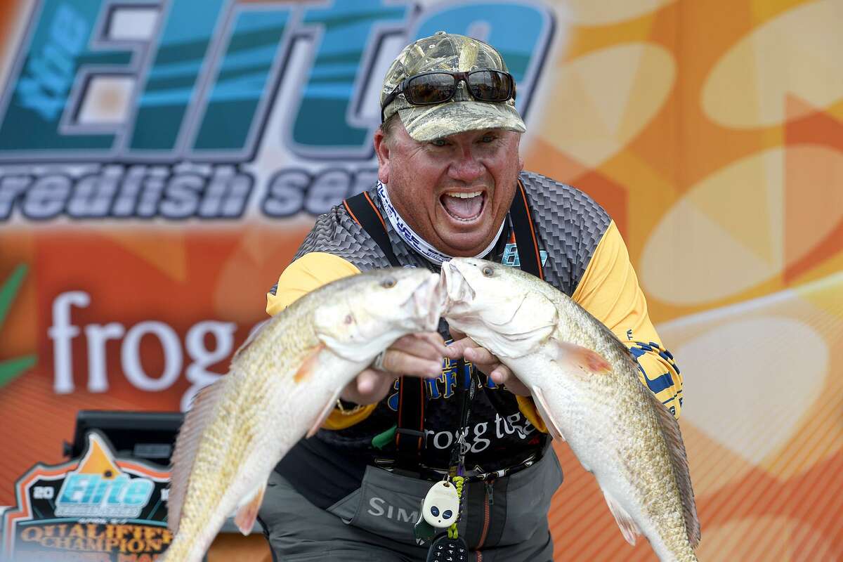 Steve Smith shows two of his fish he caught during the Elite Redfish Series in Port Arthur. The tournament gave competitors a map of which areas they were not allowed to fish in Louisiana. Photo taken Thursday 4/5/18 Ryan Pelham/The Enterprise
