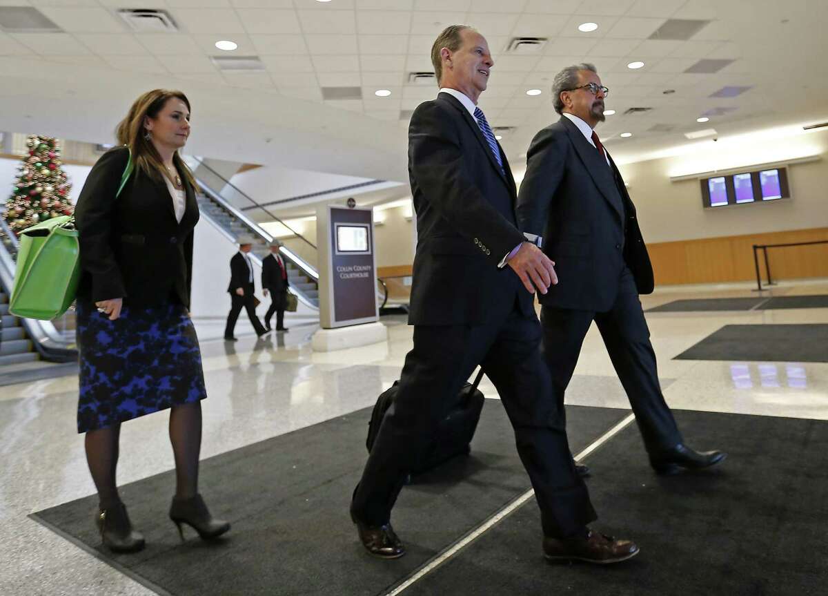Special prosecutors Nicole DeBorde, left, Brian Wice, center, and Kent Schaffer leave the Collin County courthouse after Texas Attorney General Ken Paxton's pre-trial motion hearing on Tuesday, Dec. 1, 2015, in McKinney, Texas. (Jae S. Lee/The Dallas Morning News)