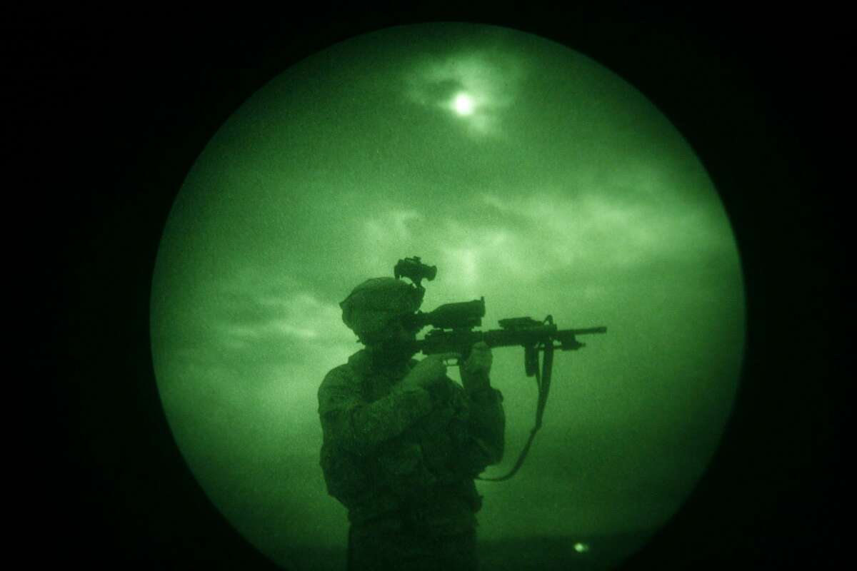 Character and illness are two separate things. Post-traumatic stress disorder can and does happen to courageous and strong members of the military. Here,a U.S soldier looks through the scope of his weapon in 2008 during a night patrol in Afghanistan.
