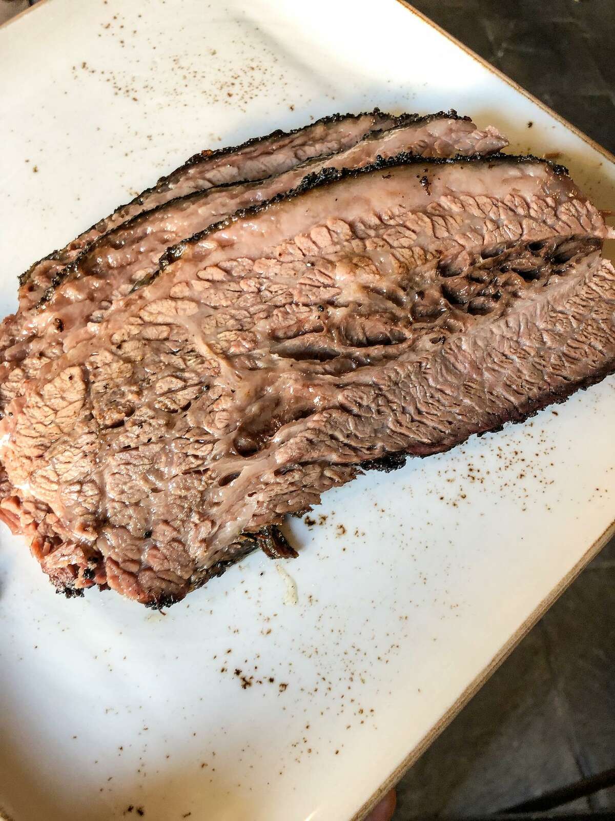 The owners of Blacket, a barbecue restaurant in Como, Italy, was inspired by a trip to Texas where the owners first tasted barbecue. Shown: brisket.