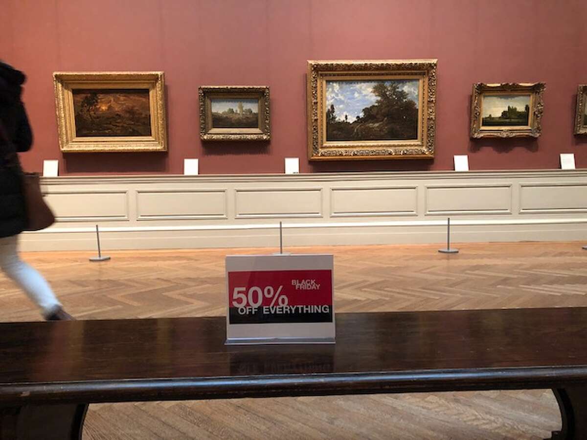 New York artist Nelson Saiers placed Black Friday sale signs around the Metropolitan Museum of Art on November 23, 2018.