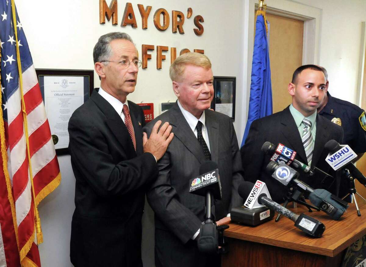 During a 2012 news conference in reaction to a federal court decision that East Haven was not responsible for damages for the controversial shooting death of Malik Jones, an African-American, Mayor Joseph Maturo, left, was joined by attorney Hugh Keefe, right, and attorney Joseph Zullo, far right. Keefe currently represents the town in a lawsuit filed against Maturo and town officials over the alleged retaliation against East Haven Police Officer Vincent Ferrara, who helped federal investigators send four cops to prison for violating the rights of Latino residents.