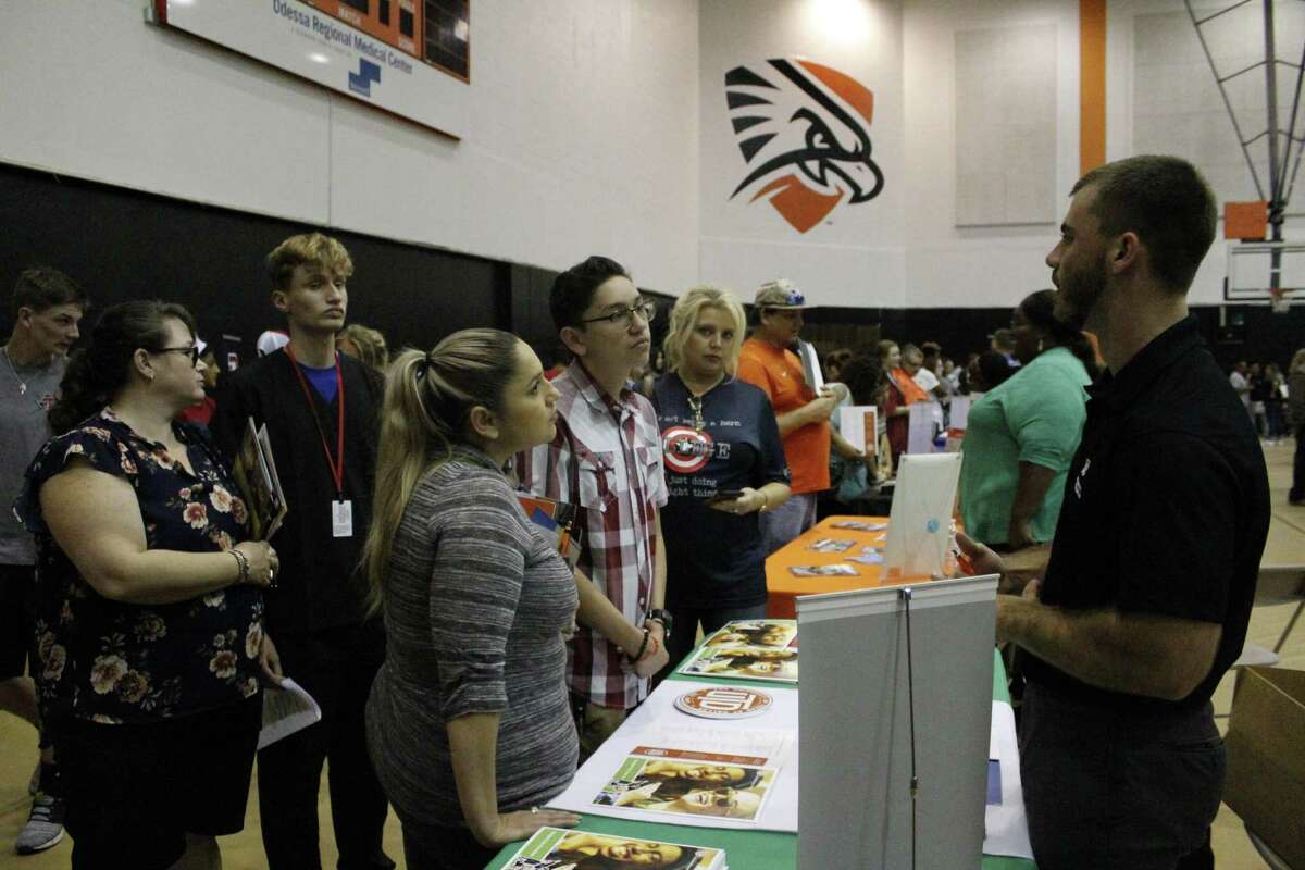 Eighth- through 12th-grade students visit with more than 50 colleges and universities recently during College Night in Ector County in West Texas. A shortage of financial aid may hamper many students’ ability to go to college.