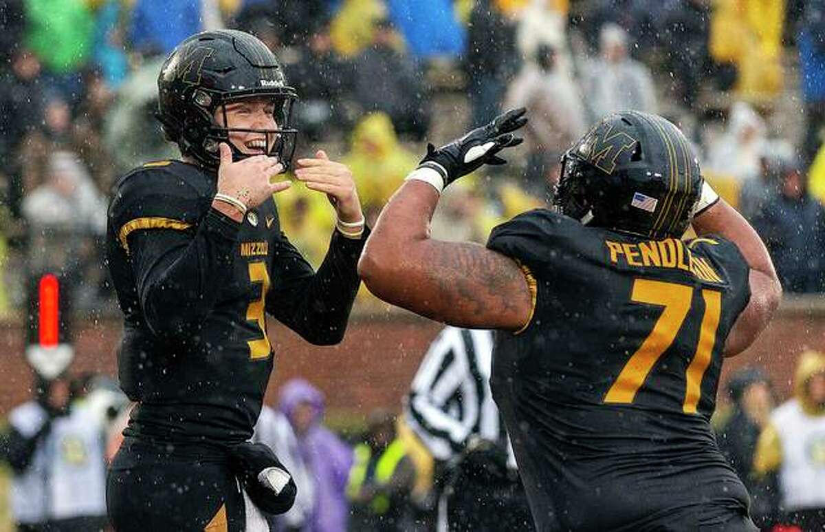 COLLEGE FOOTBALL: Lock, Mizzou rout Arkansas