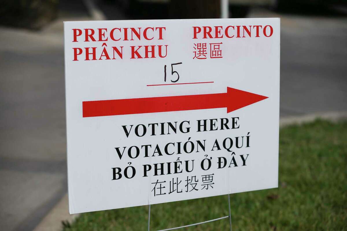A multi-language voting sign at Precinct 15 St. Andrew’s Presbyterian Church welcomes voters on Election Day on Tuesday, Nov. 6, 2018, in Houston.