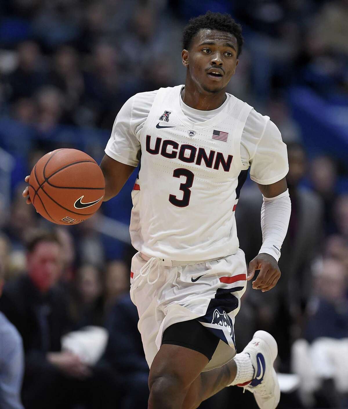 UConn’s Alterique Gilbert dribbles up the court during the second half against New Hampshire on Saturday.
