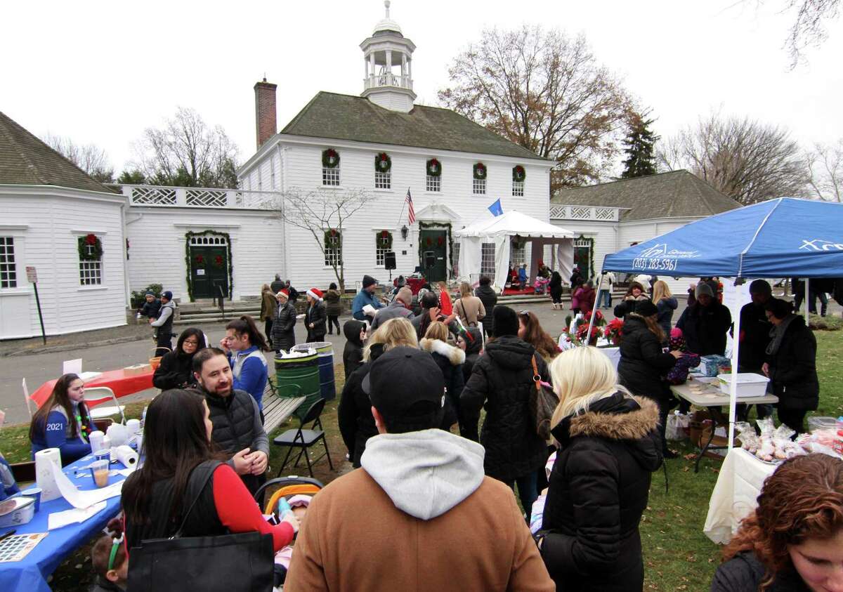 Fairfield Chamber of Commerce's annual ?“Santa's Arrival?” on the historic Town Green at Old Town Hall in Fairfield, Conn., on Saturday Nov. 24, 2018. Santa arrived at 10 a.m. via a firetruck from the Fairfield Fire Department. Along with a petting zoo and horse drawn carriage rides, local businesses and nonprofit organizations showcased their products and services in tents and kiosks around the green.