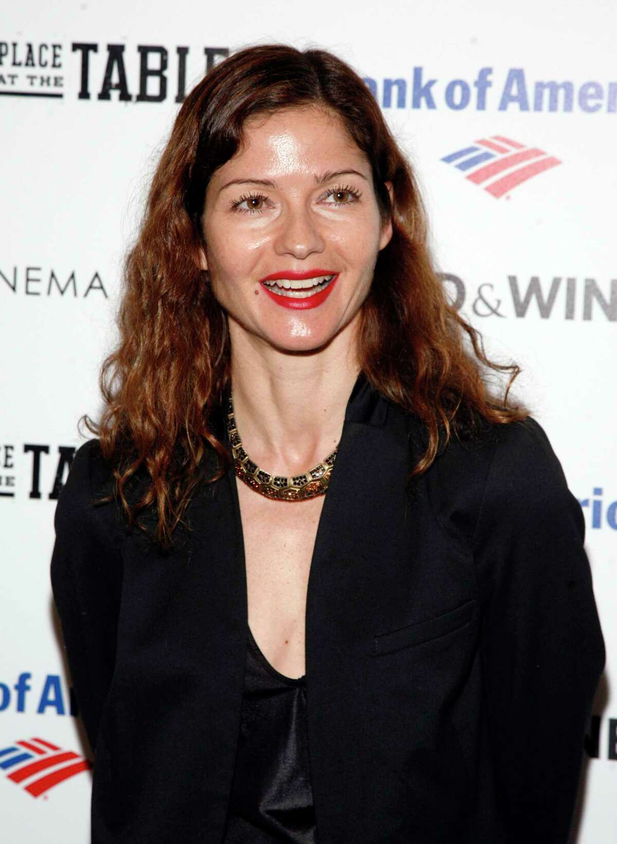Actress Jill Hennessy attends a screening of "A Place at the Table" presented by Bank of America and The Cinema Society on Wednesday Feb. 27, 2013, at the Museum of Modern Art in New York. (Photo by Andy Kropa/Invision/AP)