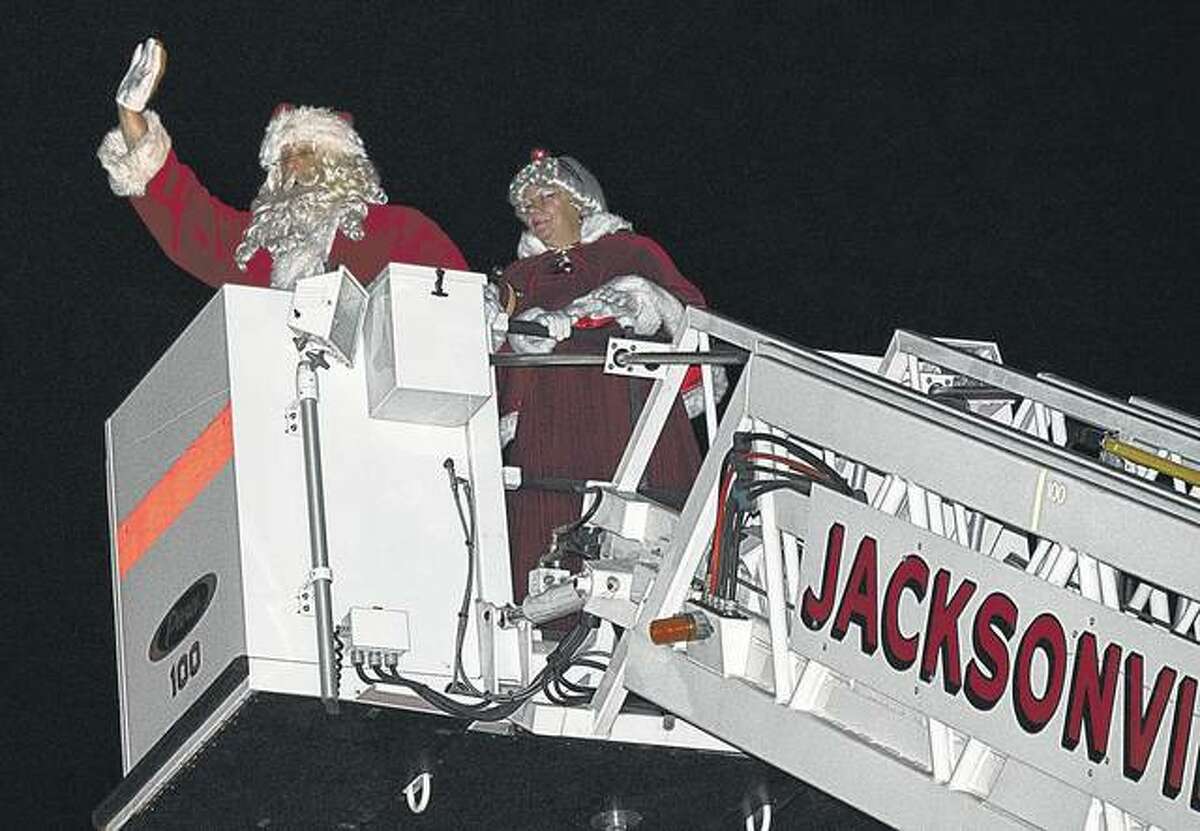 Santa and Mrs. Claus make their arrival to downtown Jacksonville on Saturday.