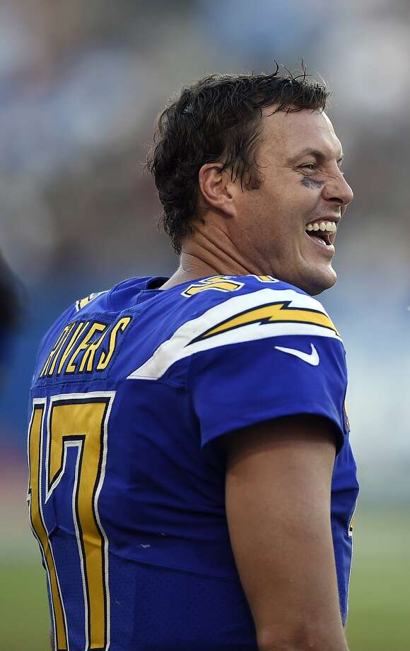 Philip Rivers completed his first 25 runs on Sunday. Photo: Kelvin Kuo / Associated Press