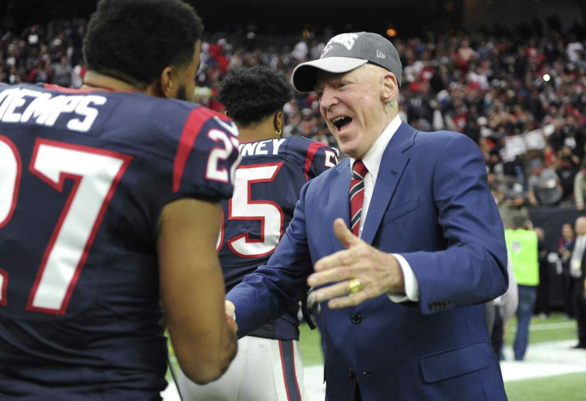 FILE - In this Jan. 3, 2016, file photo, Houston Texans owner Robert "Bob" McNair, right, greets players after the team's win over Jacksonville Jaguars in an NFL football game in Houston. McNair, billionaire founder and owner of the Texans, has died. He was 81. One of the NFL's most influential owners, McNair had battled both leukemia and squamous cell carcinoma in recent years before dying in Houston on Friday, Nov. 23, 2018. (AP Photo/Eric Christian Smith, File)