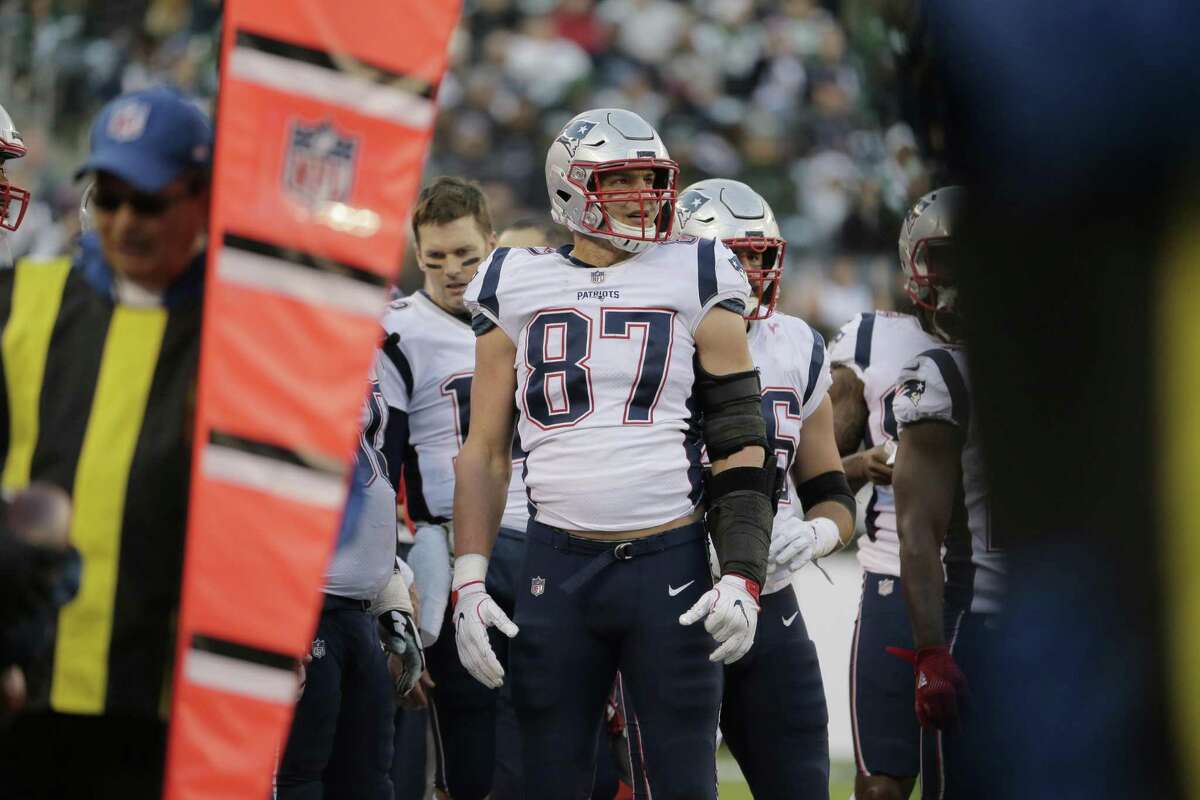 Patriots tight end Rob Gronkowski (87) looks on from the sidelines during Sunday’s game agaisnt the Jets.