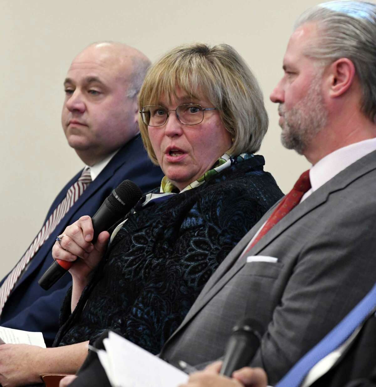 Maria Lehman, former chief operating officer and acting executive director for the New York State Thruway Authority, center, speaks during a forum on the rebuilding needs of the NYS Thruway on Monday, Nov. 26, 2018, in Colonie, N.Y. Joining her are; Michael Fleischer former Thruway authority executive director, left, and Thomas Madison former Thruway Authority executive director, right. (Will Waldron/Times Union)