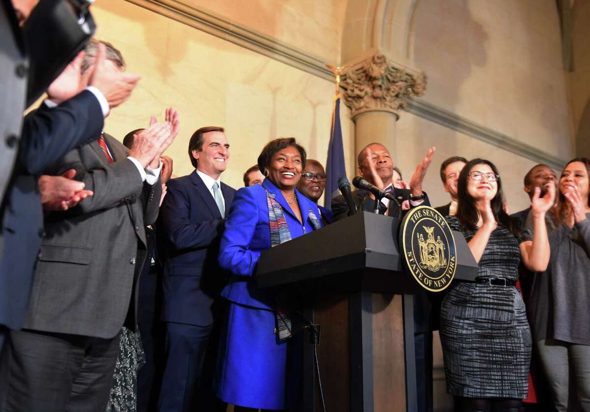 Senator Andrea Stewart-Cousins is cheered by fellow Senate Democrats after being named as state Senate majority leader on Monday, Nov. 26, 2018, at the Capitol in Albany, N.Y. She is the first female majority leader in either house of the state legislature. (Will Waldron/Times Union)