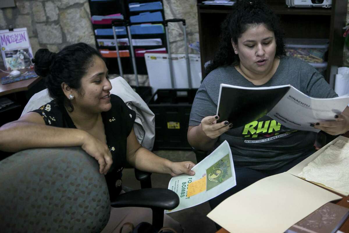 Madeline Sanibanez and Kim Bonoan work on lesson plans for upcomming after school programs at Martinez Street Women?•s Center, Thursday, Nov. 8, 2018. The center works to improve the community through encouraging positive development based on social justice principles; woman-led community health programming.