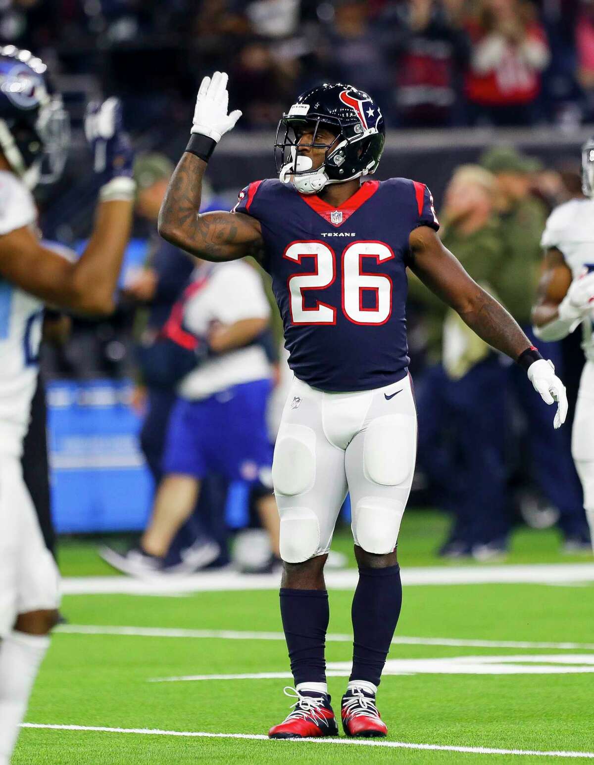 Houston Texans running back Lamar Miller (26) celebrates a first down during the first quarter of an NFL football game at NRG Stadium on Monday, Nov. 26, 2018, in Houston.