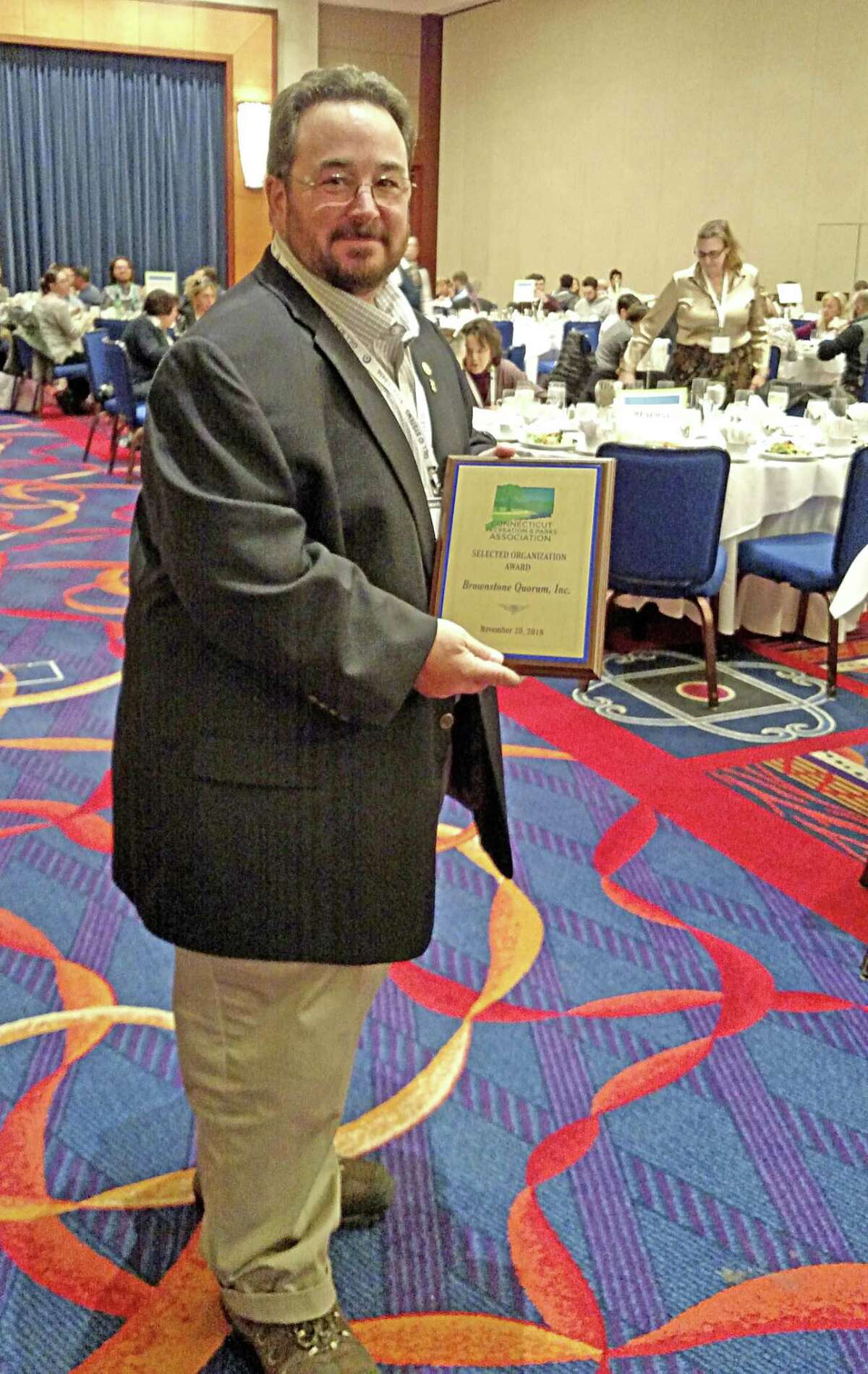 Jim Tripp, president of the Brownstone Quorum of Portland, recently received an award from The Connecticut Recreation and Parks Association for his leadership of Riverfront Park.