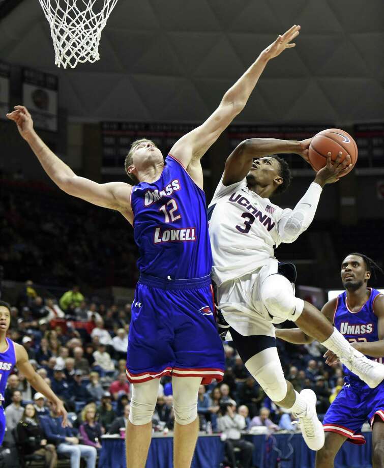 UConn's Alterique Gilbert (3) faces off against Sesan Russell (2) of UMass-Lowell (2) in the first half of an NCAA college basketball game on Tuesday, November 27, 2018 in Storrs, Connecticut (Photo AP / Stephen Dunn). Stephen Dunn / Associated Press / Copyright 2018 The Associated Press. All rights reserved