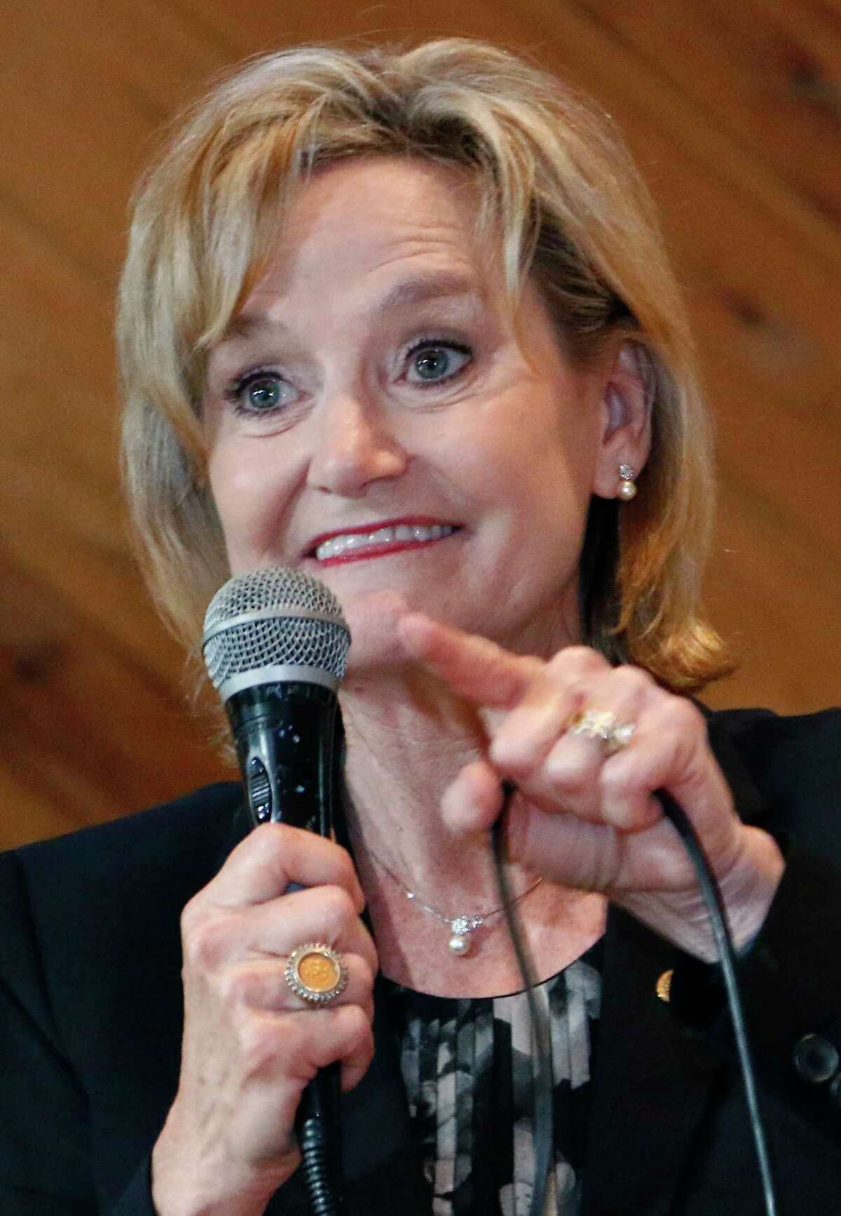 FILE - In this Nov. 5, 2018, file photo, U.S. Sen. Cindy Hyde-Smith, R-Miss., addresses a gathering of supporters in Jackson, Miss. The last U.S. Senate race of the midterms was coming to a close Tuesday as Mississippi residents chose between Hyde-Smith, a white Republican Senate appointee whose "public hanging" comments angered many people, and Mike Espy, a black Democrat who was agriculture secretary when Bill Clinton was in the White House.