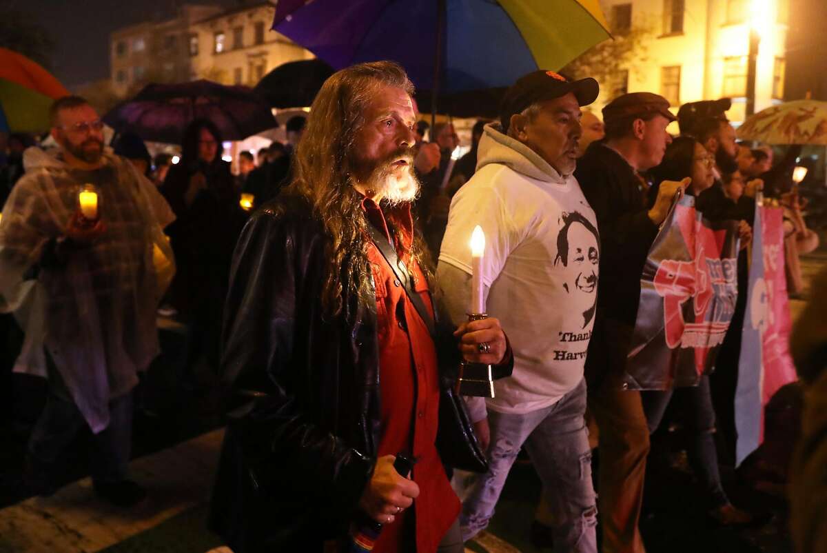 Bo Ayres marches down Market Street during annual candlelight walk from The Castro to City Hall in memory of Harvey Milk and Mayor George Moscone, who were slain 40 years ago in San Francisco, Calif.. Photographed on Tuesday, November 27, 2018.