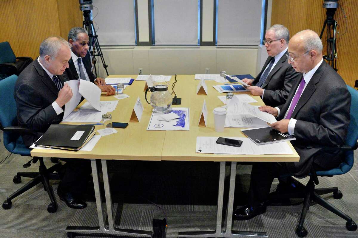 NYS Compensation Committee members, from left, Tom DiNapoli, H. Carl McCall, Scott Stringer and William Thompson, Jr. during a public hearing Wednesday Nov. 28, 2018 in Albany, NY. The committee is tasked with recommending raises for state legislators and other public officials. (John Carl D'Annibale/Times Union)