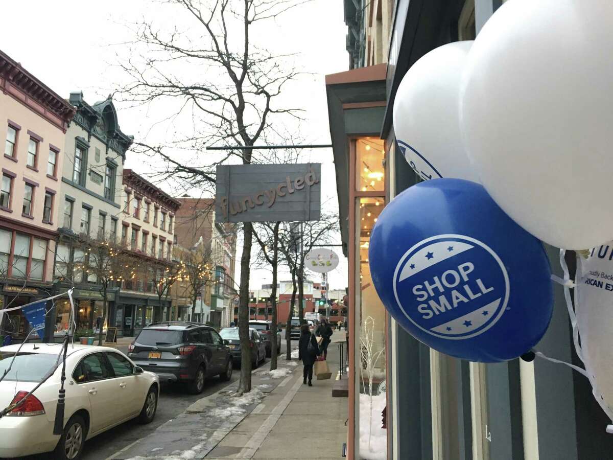 Balloons and decorations welcomed shoppers to downtown Troy on Small Business Saturday. Throughout the country, shoppers spent nearly $18 billion at local, independently-owned businesses.