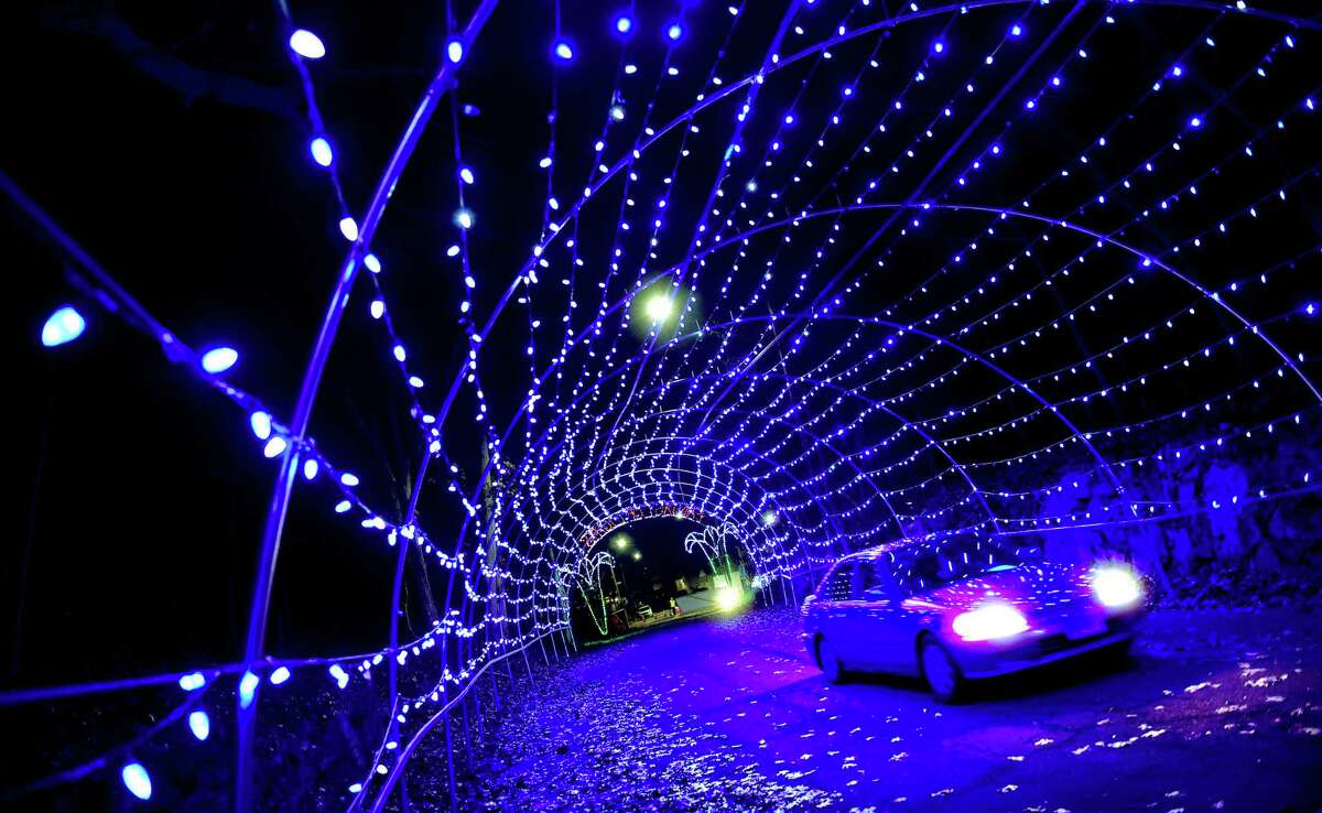 A car makes it's way through the Fantasy of Lights display at Lighthouse Point Park in New Haven on November 28, 2018. The annual display raises money for Goodwill of Southern New England.