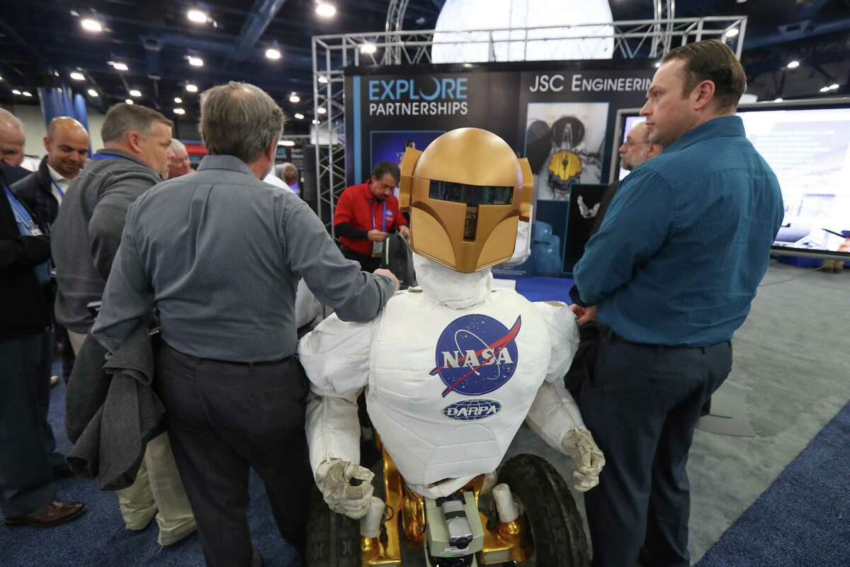 A Johnson Space Center Tele Robot is on display on the show floor at the annual SpaceCom (Space Commerce Conference and Exposition) Tuesday, Nov. 27, 2018, in Houston.