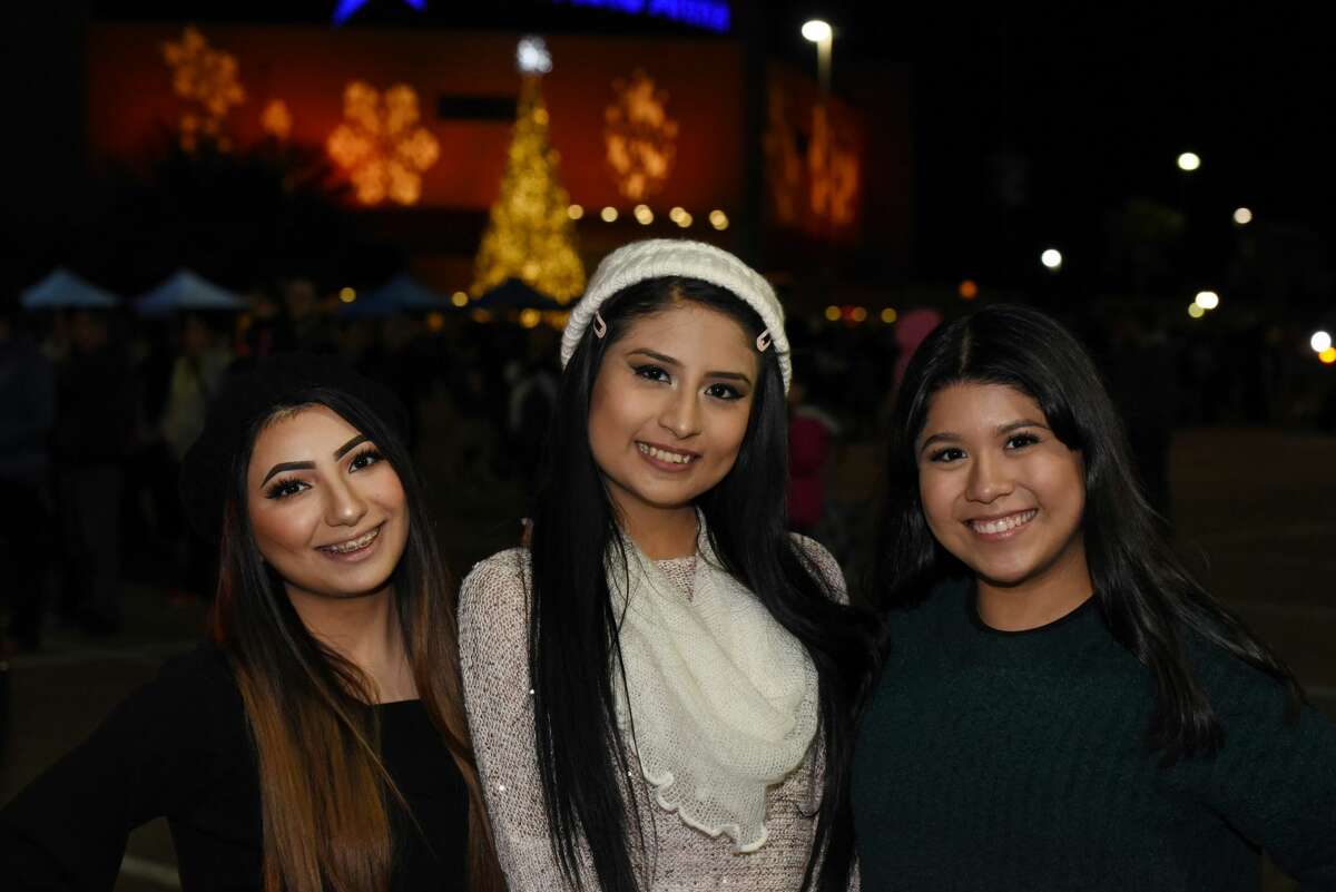 Attendees pose for a photo during the Navidad Fest.