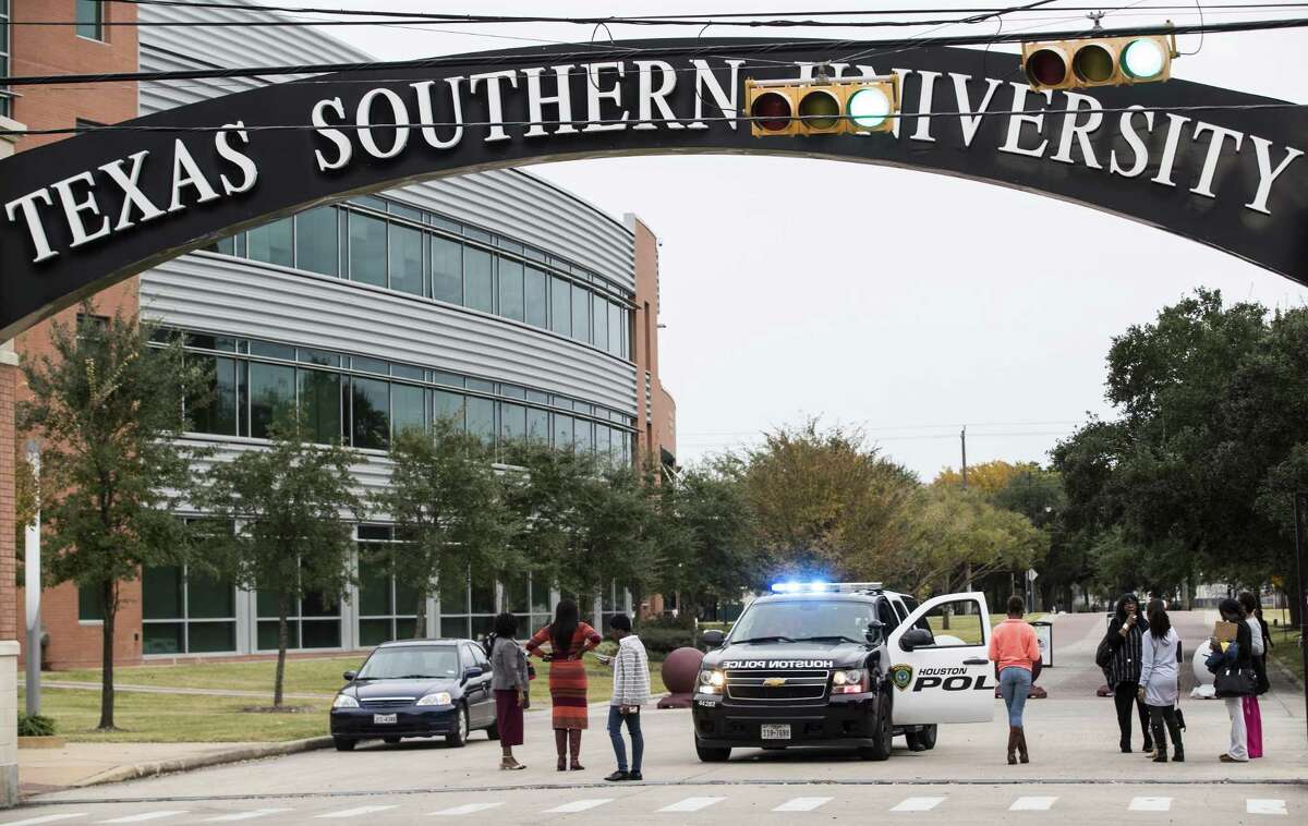 People stand outside one of the gates at Texas Southern University after the campus was evacuated due to a bomb threat on Wednesday, Nov. 28, 2018, in Houston. No explosives were found. >>Historically black colleges in Texas and the southeast and when they opened.