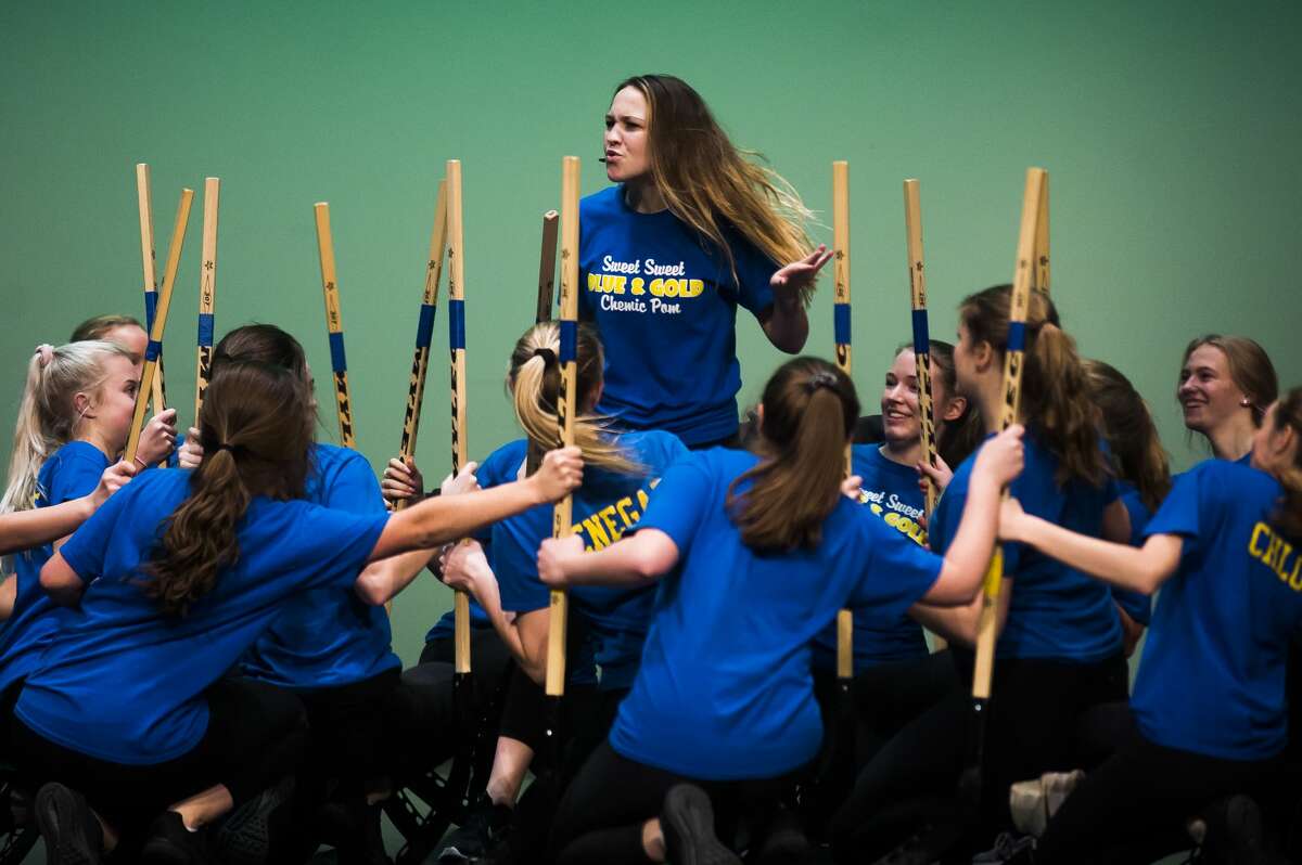Members of the Midland High School Varsity Pom squad rehearse for the school's annual Rhapsody Rendezvous on Tuesday, Nov. 27, 2018 at Midland Center for the Arts. (Katy Kildee/kkildee@mdn.net)