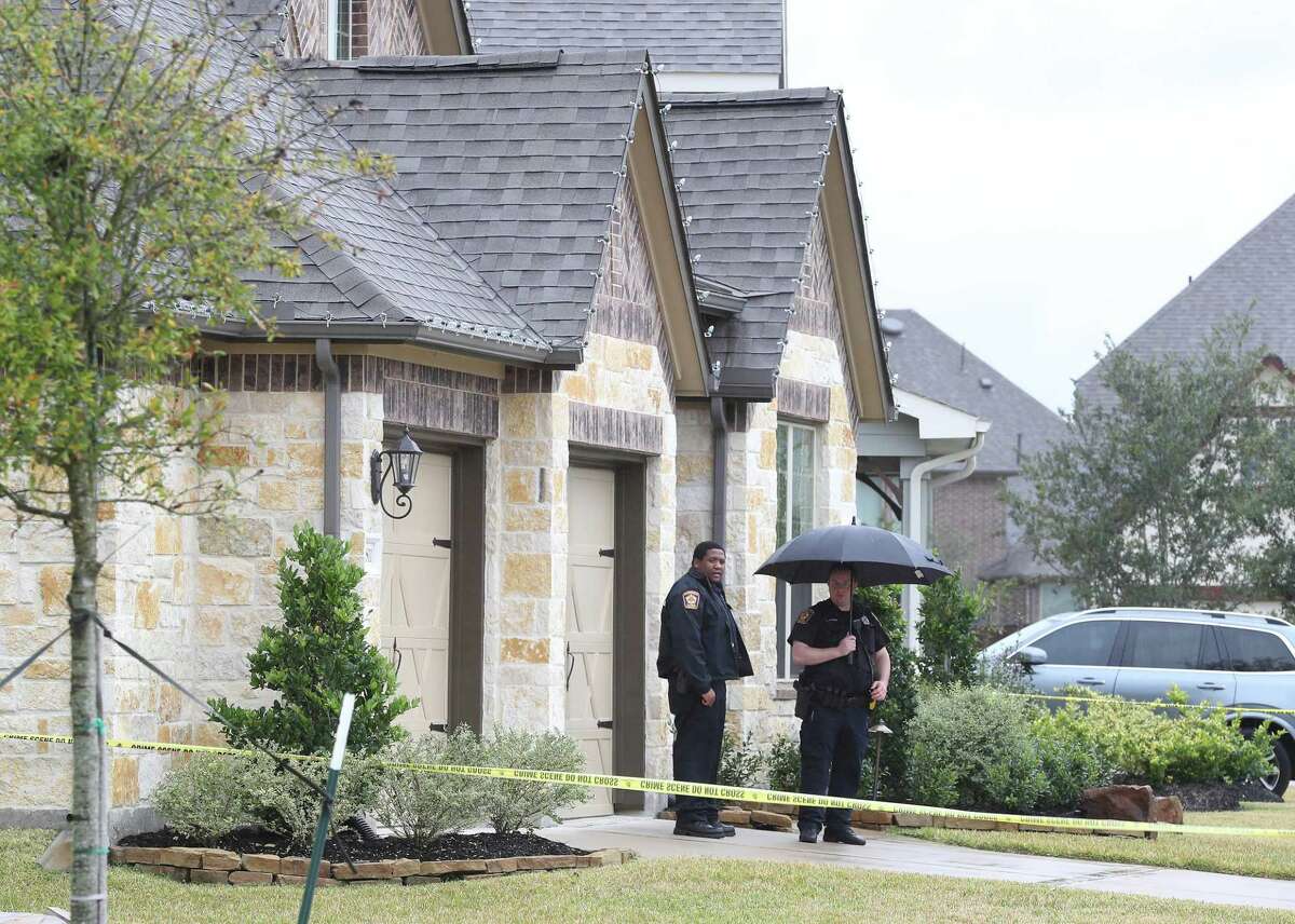 Investigators work the scene where a homeowner was killed during what is believed to have been a home invasion in the 10800 block of Gates Randall Court Thursday, Nov. 29, 2018, in Cypress.