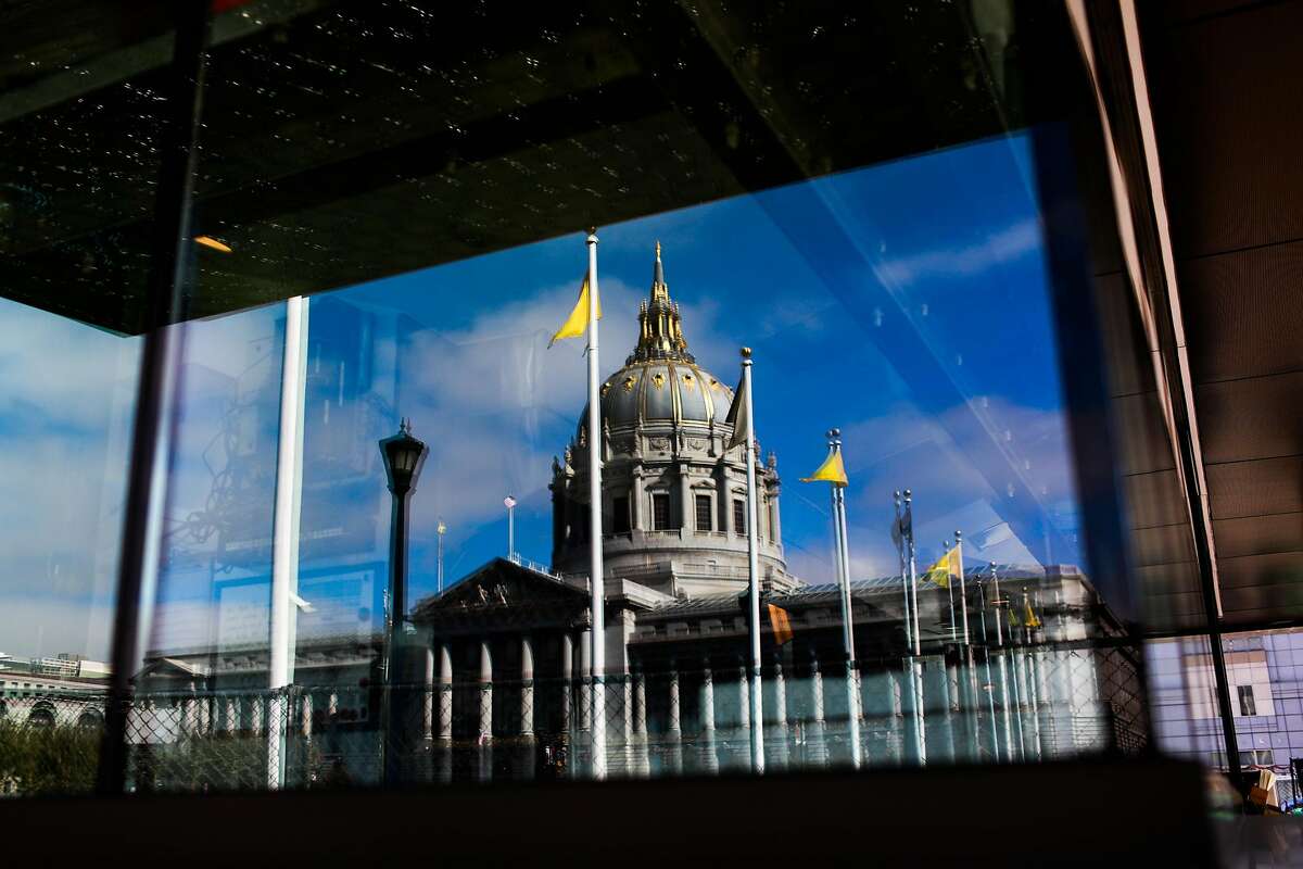 City Hall is seen in the window of Bi-Rite cafe three days before the cafe opens at Civic Center in San Francisco, California, on Sunday, Oct. 21, 2018.