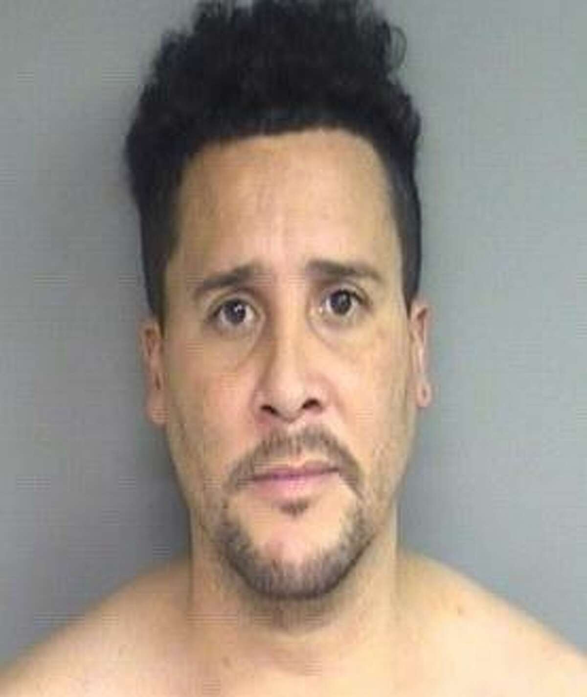 Hector Collazo-Lopez, 42, was arrested Tuesday in connection with the death of his wife Olga Iris Lopez on Tuesday, Nov. 27, 2018. Police said he did not call an ambulance to his mother’s single bedroom apartment on Pequot Drive where he and Lopez were were living with their three children, in time to save her life.