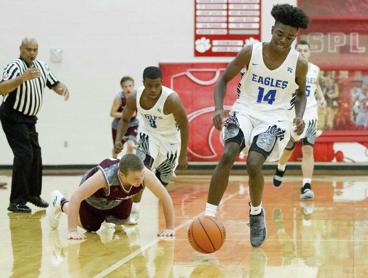 New Caney shooting guard Kaylye Jackson (14) tracks down a loose ball in the fourth quarter of a high school basketball game during the 2018 Splendora Invitational at Splendora High School, Thursday, Nov. 29, 2018, in Splendora.
