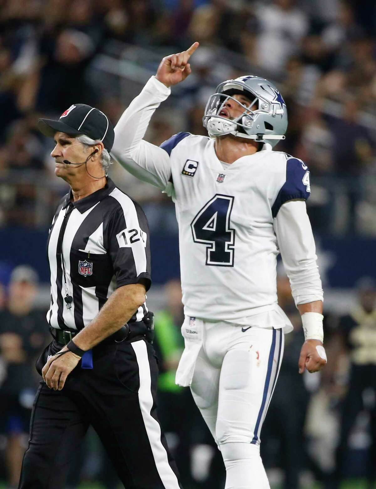 Cowboys stifle Brees, end Saints' 10-game win streak, 13-10