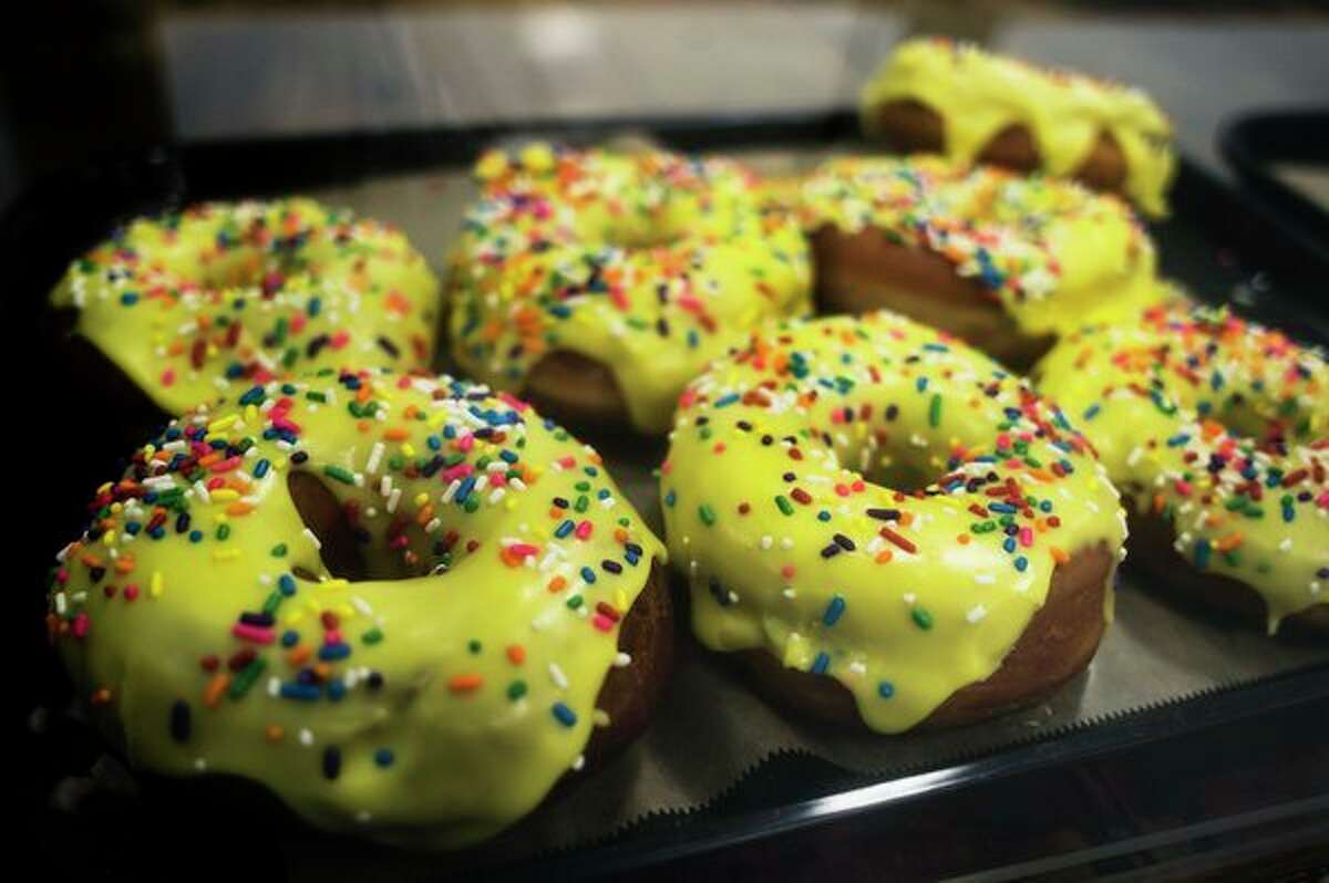 Donuts with icing and sprinkles are available at Sticky Paw Donuts & Diner, located at 3124 Jefferson Ave. (Katy Kildee/kkildee@mdn.net)