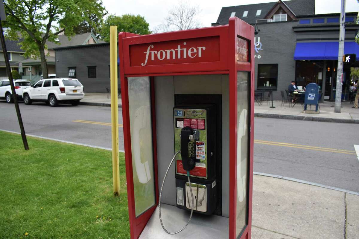A Frontier Communications coin pay phone in Rochester, N.Y., in May 2017. After asking New York regulators that year for permission to end blanket distribution of telephone books there, Connecticut regulators signaled plans entering December 2018 to follow suit.